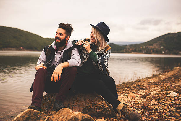 Happy hipster couple on an adventure