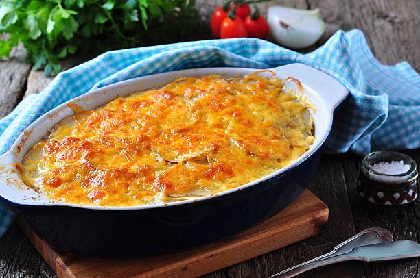 istock potato casserole with chicken, onions and cheese 492076536