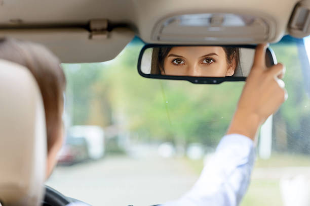 istock Pleasant girl driving a car 492076576