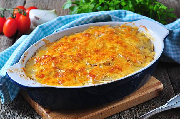 istock potato casserole with chicken, onions and cheese 492076896