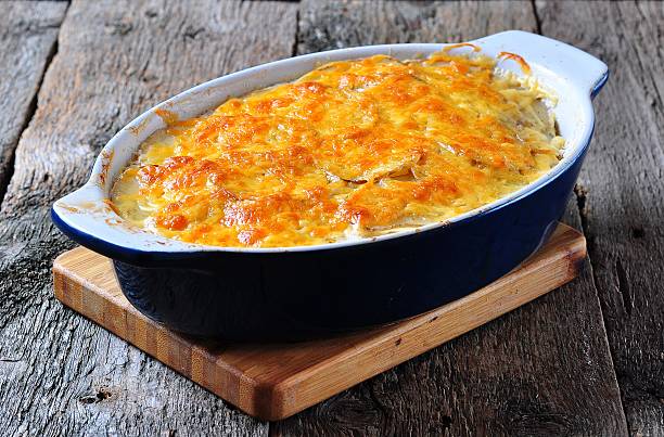 istock potato casserole with chicken, onions and cheese 492076954