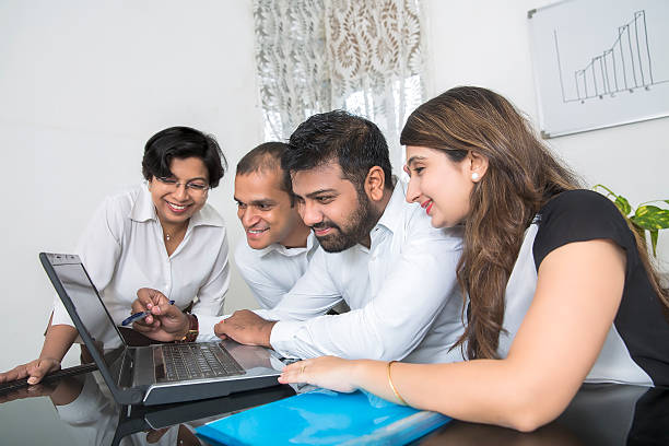 istock Young and cheerful Business team in a brainstorming session. 492078656