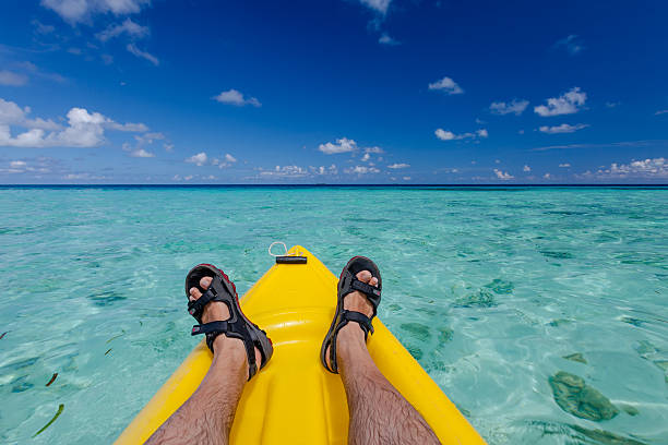 istock Caucasian man kayaking in sea at Maldives 492092636