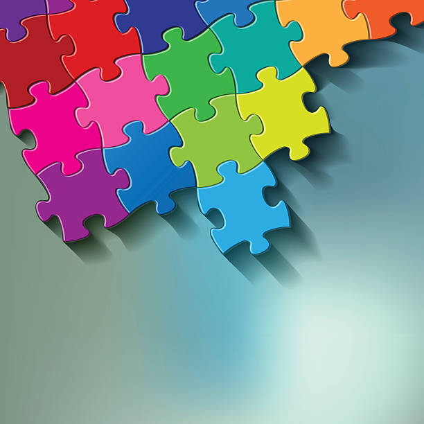istock PUZZLE colorful on a blue bokeh fog background. 492096714