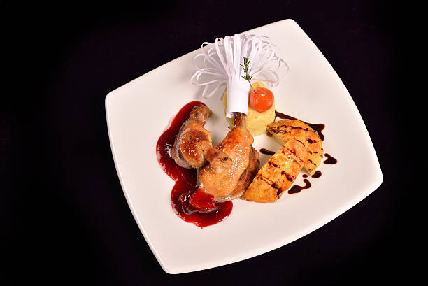 istock Glazed duck leg, risotto with truffle oil, fig and sauce 492098278