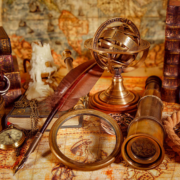 istock Vintage magnifying glass lies on an ancient world map 492098686