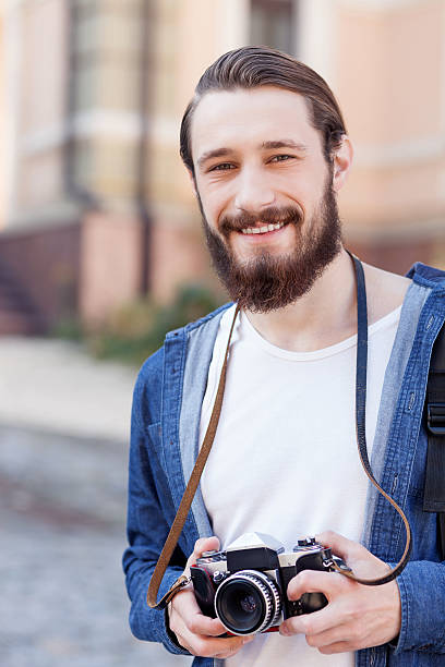 istock Attractive bearded man is traveling across town 492101814