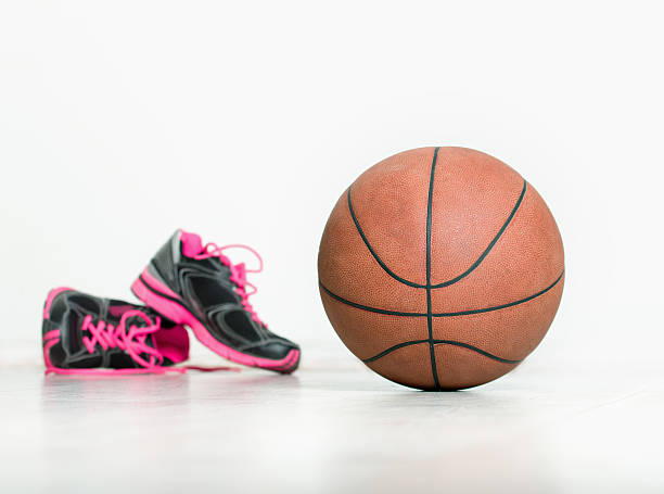 istock Ball and sneakers for basket 492103268
