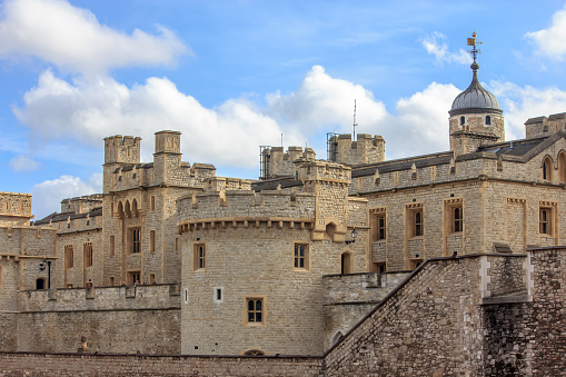 London, United Kingdom - May 30, 2023:  People waiting in a row for the entrance to the famous Tower of London.