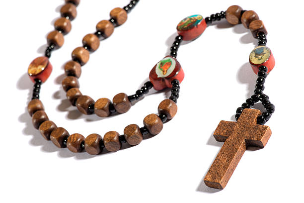 istock Roman Catholic rosary on white 492105898