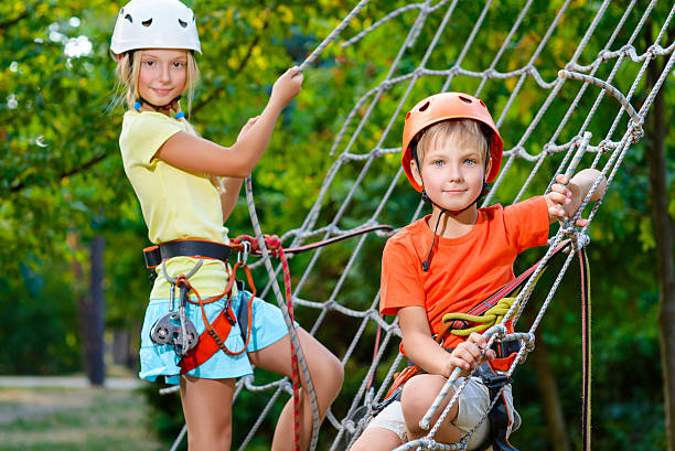 istock Smiling boy and girl playing when having fun doing activities 492118378
