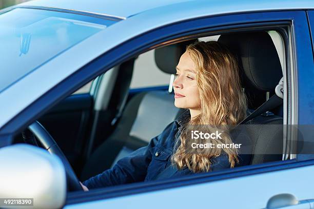 Young Confident Woman Driving A Car Stock Photo - Download Image Now - 2015, Adult, Authority