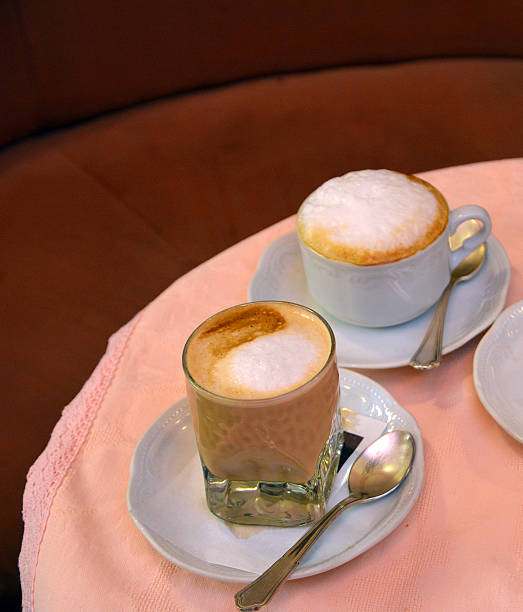 istock Delicious cappuccino on a glass cup on a table 492120546