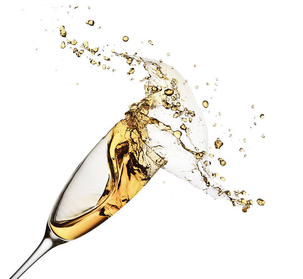 istock champagne splash from glass isolated on the white background 492121098