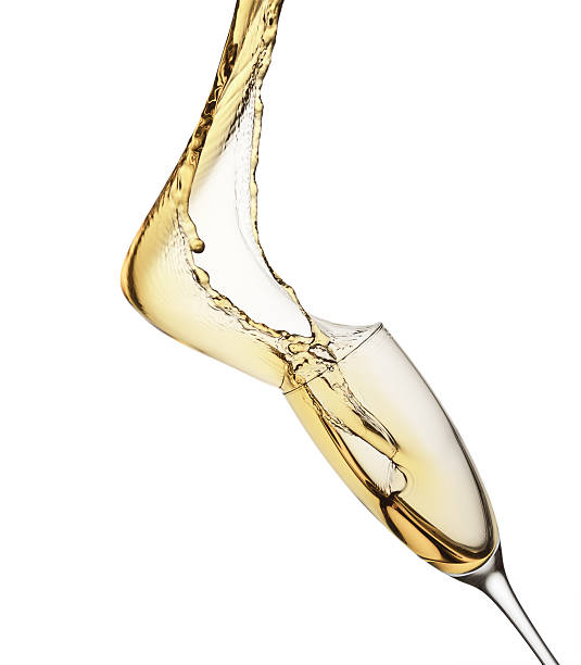 istock champagne splash from glass isolated on the white background 492121106