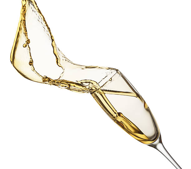istock champagne splash from glass isolated on the white background 492121136
