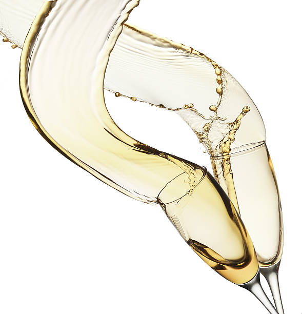 istock champagne splashes from glasses isolated on the white background 492121206