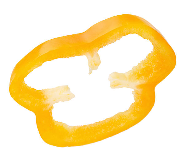 istock yellow pepper slice isolated on the white background 492122332