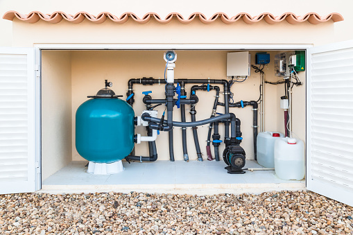 Brine, Salt water, swimming pool filter, valves and pumps in a purpose built hut.