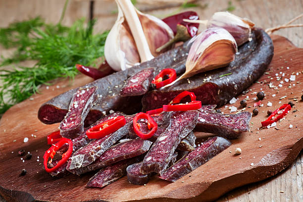 istock Sliced smoked sausage with garlic and pepper 492124026