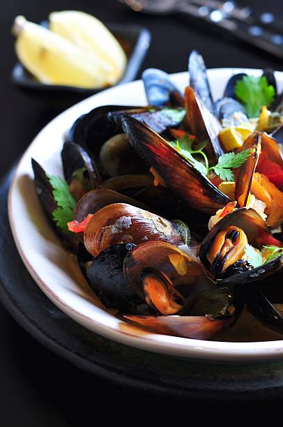 istock soup of wild mussels with white wine, vegetables, sage, coriander 492124154