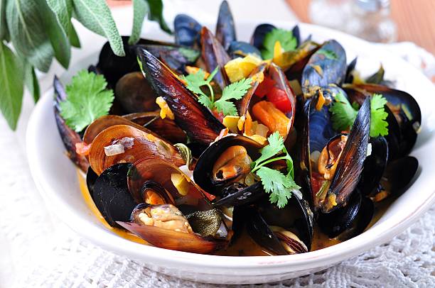 istock soup of wild mussels with white wine, vegetables, sage, coriander 492124656