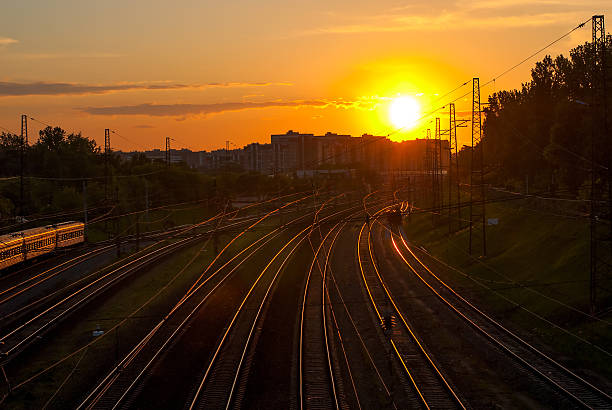 istock railroad tracks in the sunlight at sunset 492126390