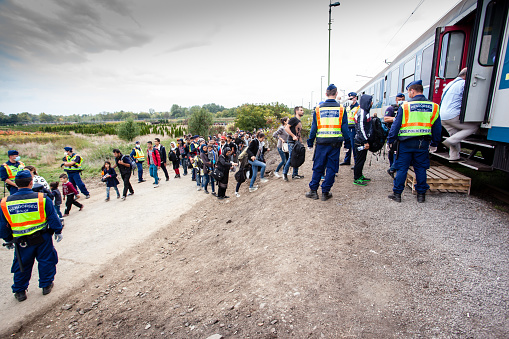 Zakany, Hungary - October 6, 2015: War refugees at Zakany Railway Station, Refugees are arriving constantly to Hungary on the way to Germany. 6 Octoberber 2015 in Zakany, Hungary.