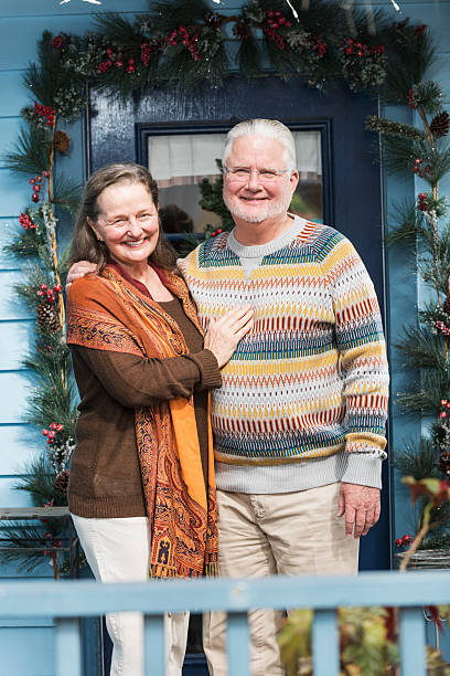 istock Senior couple outside front door 492129806
