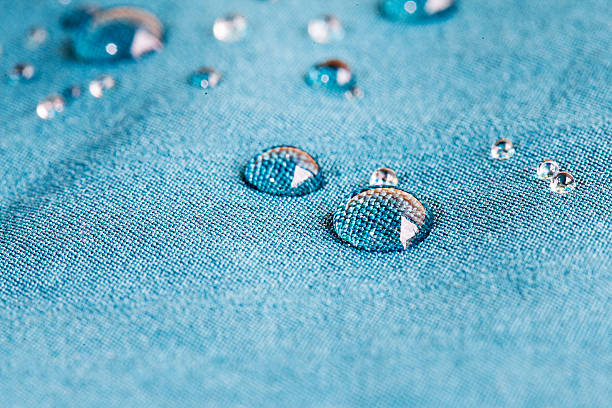 Waterprof fabric waterprof fabric with waterdrops waterproof stock pictures, royalty-free photos & images