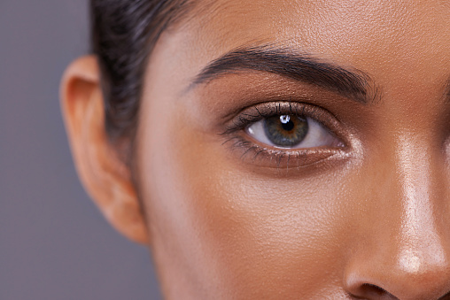 Closeup portrait of a beautiful young woman in the studio