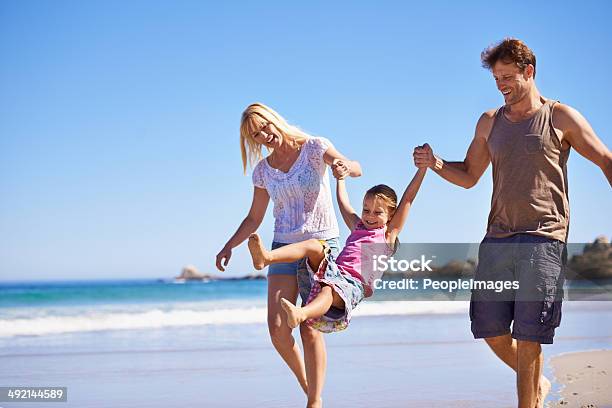 Playing On The Beach Stock Photo - Download Image Now - Beach, Beautiful People, Cute