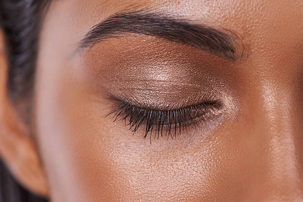 Shimmer and shine Closeup shot of a beautiful young woman in the studio eyeshadow stock pictures, royalty-free photos & images