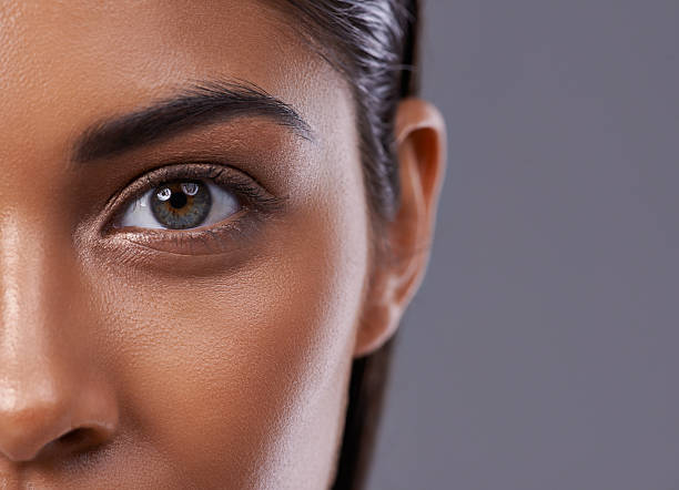 There's inner beauty behind those eyes Closeup portrait of a beautiful young woman in the studio color intensity stock pictures, royalty-free photos & images