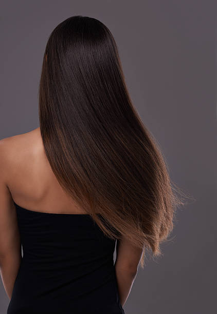Healthy hair at it's best! Rear view of a young woman with beautiful long hair black hair stock pictures, royalty-free photos & images