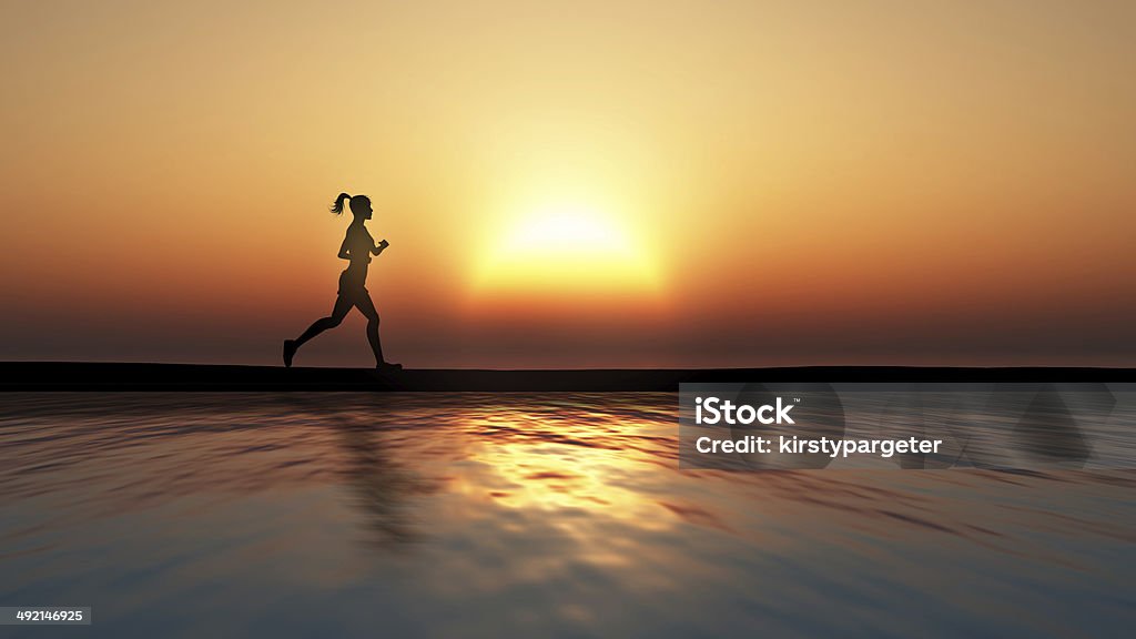 Female jogging against a sunset ocean 3D render of a female jogging against a sunset over an ocean Adult Stock Photo