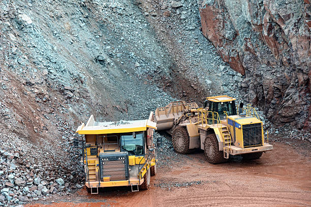 istock earth mover loading dumper truck surface mine 492147037