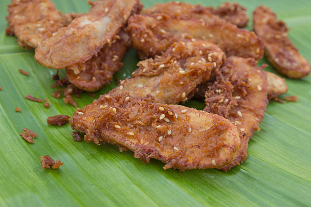 Fried banana is Thai dessert, on green banana leaf