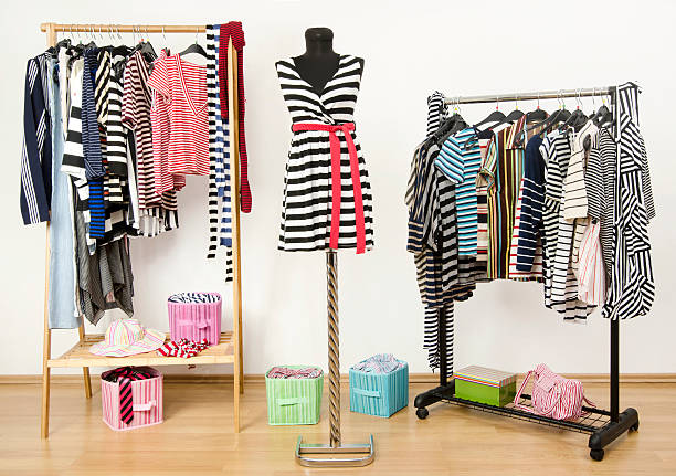 istock Colorful wardrobe full of clothes and accessories with stripes pattern. 492149507