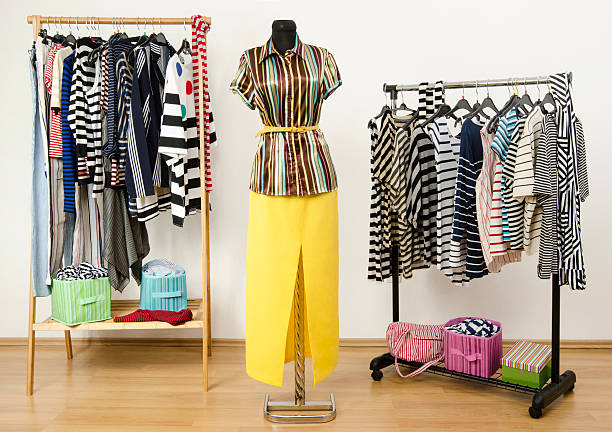 istock Colorful wardrobe full of clothes and accessories with stripes pattern. 492149527