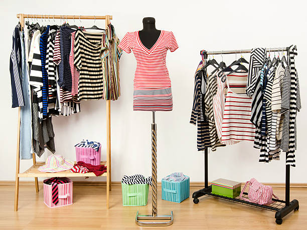 istock Colorful wardrobe full of clothes and accessories with stripes pattern. 492149643