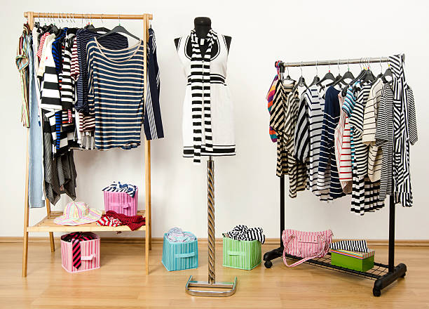 istock Colorful wardrobe full of clothes and accessories with stripes pattern. 492149663