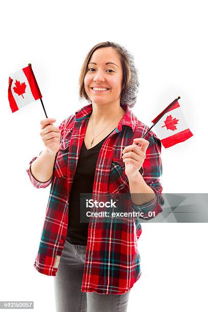 Young Woman Celebrating Canadas Day Stock Photo - Download Image Now - Canadian Flag, Holding, White Background