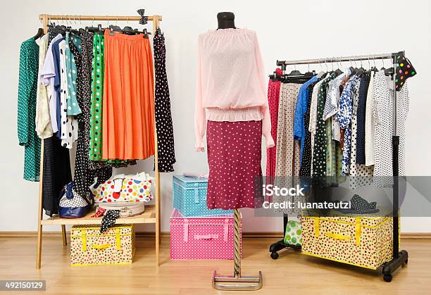 Dressing Closet With Polka Dots Clothes Arranged On Hangers Stock Photo - Download Image Now