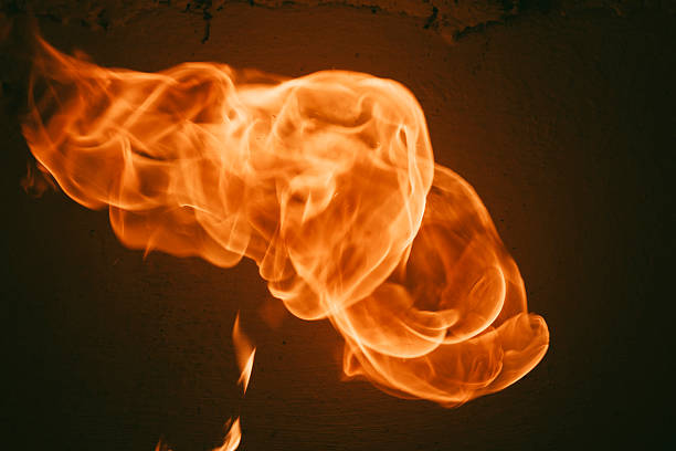 istock fire burning, flames on black background 492150750
