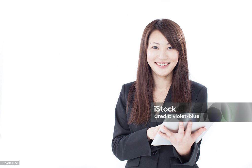 business woman with digital tablet Young Asian business woman holding digital tablet isolated on white background 20-29 Years Stock Photo