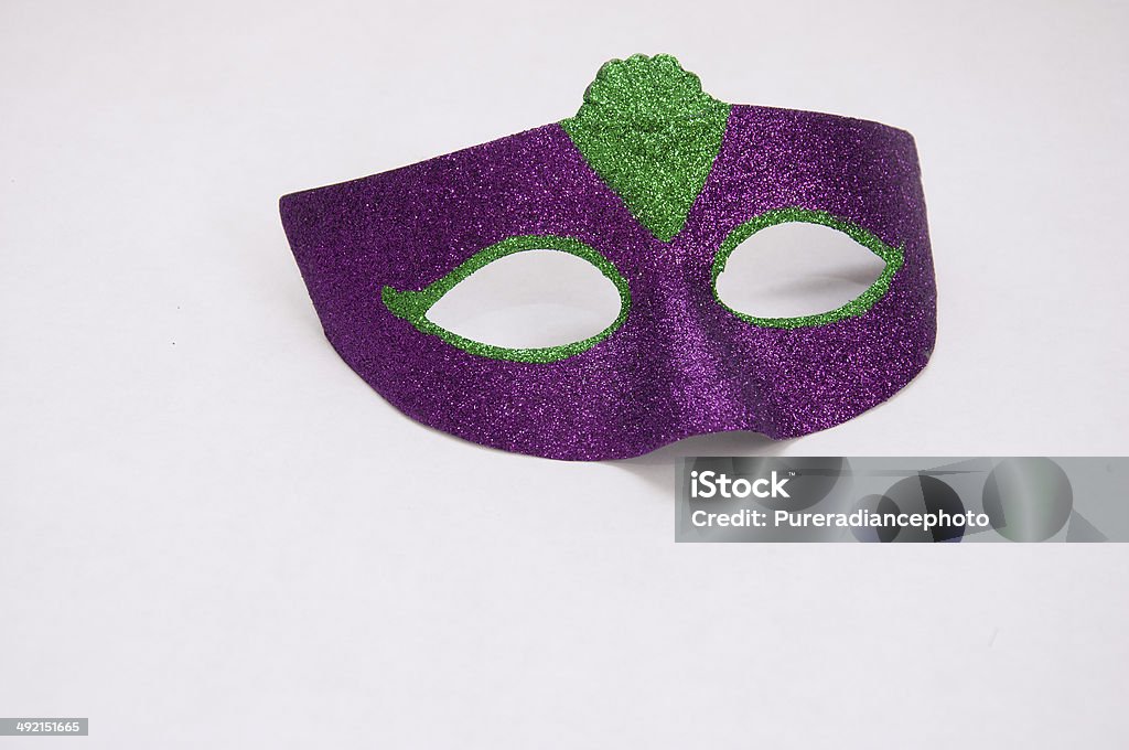 Single Mardi Gras face mask one multicolored face mask for mardi gras Bead Stock Photo