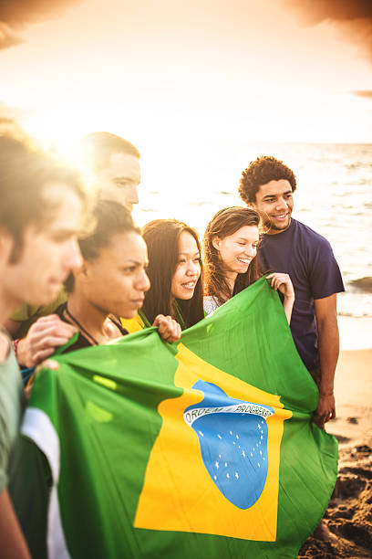 istock brazil supporter cheering togetherness at the match 492151777