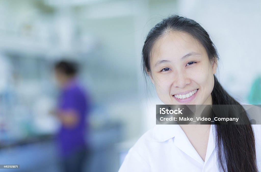 Lab Experiment Students working in the Lab Experiment 30-39 Years Stock Photo