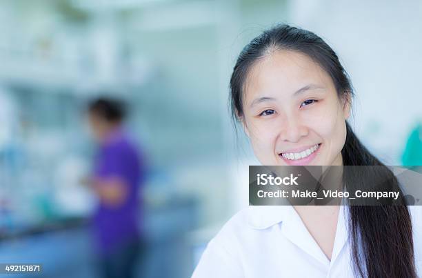 Lab Experiment Stock Photo - Download Image Now - 30-39 Years, Adult, Analyzing